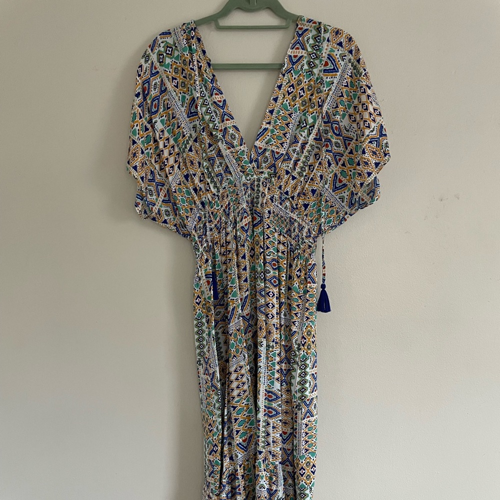 Super cute v cut maxi with tassels.
